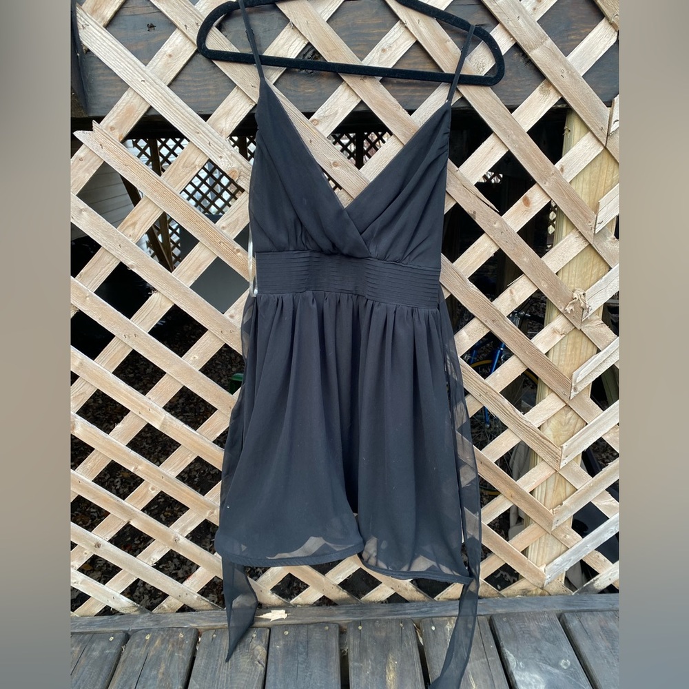 Francesca’s black mini dress